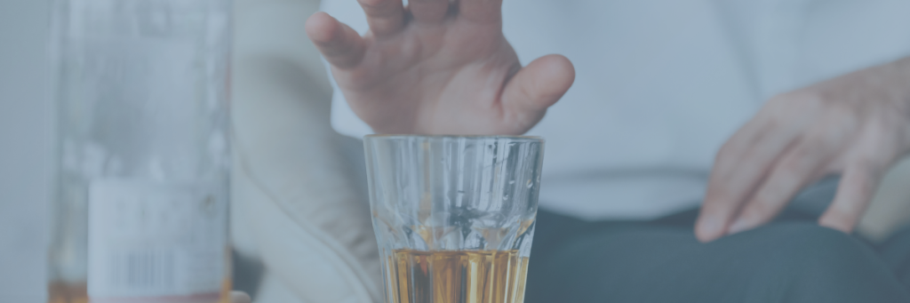 photo of man refusing alcohol